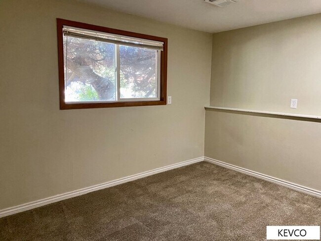 Building Photo - Great and Spacious Home with Backyard!