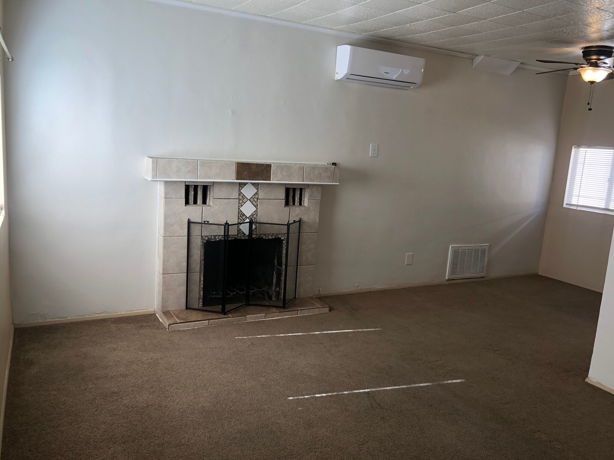 Living Area (carpet replaced with plank flooring) - 6432 Smoketree Ave