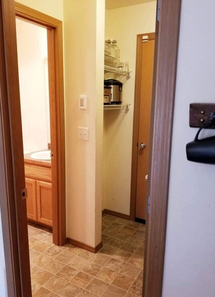 1/2 bath off of Kitchen/ laundry room. Door to garage - 15615 7th Ave E