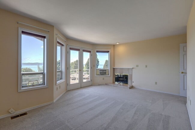 Building Photo - 4+ Bedroom with Great Entertaining Wrap Around Decks with VIEW of PUGET SOUND!!