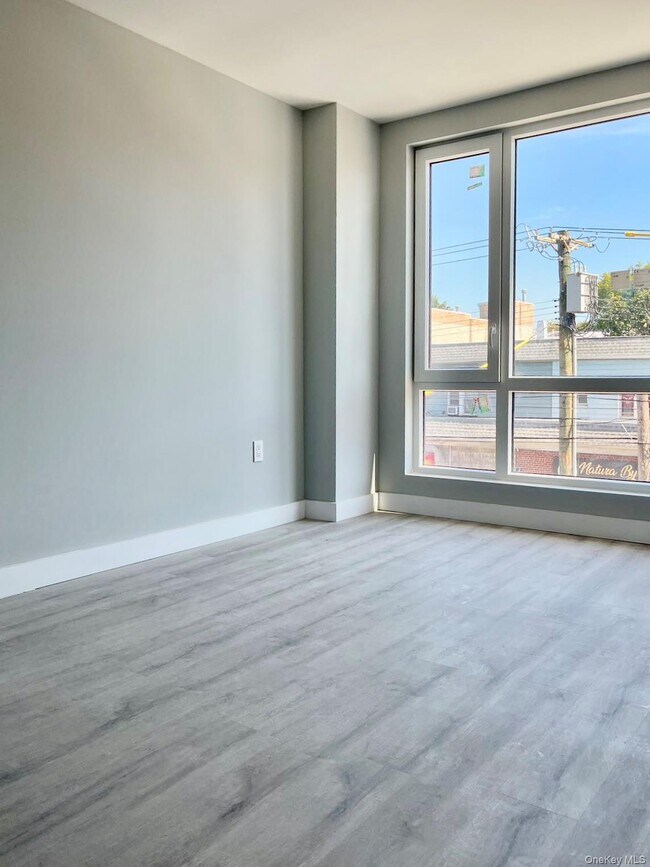 Building Photo - 20-22-22 College Point Blvd