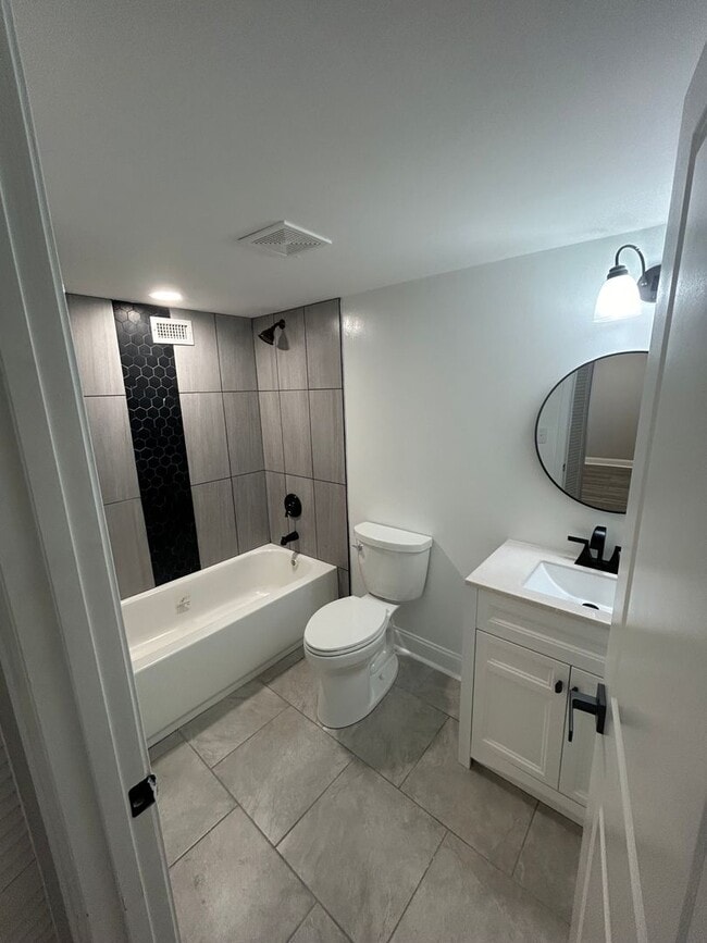 Building Photo - This fully renovated & updated 3 Bedroom a...