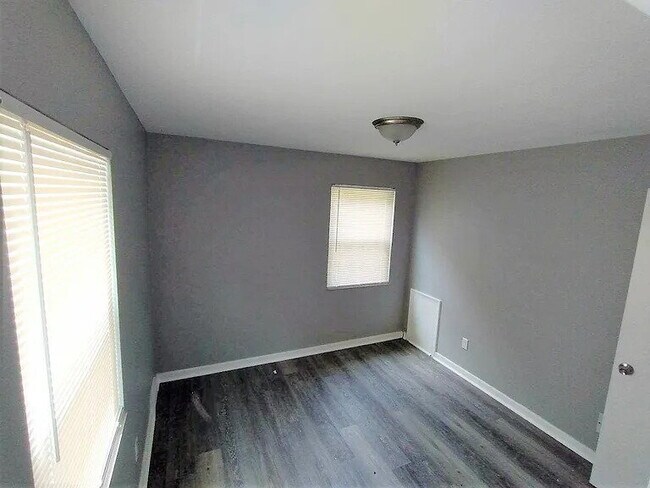 Building Photo - Beautiful Mid-Century home completely updated with two first-floor bedrooms, a spacious second-fl...