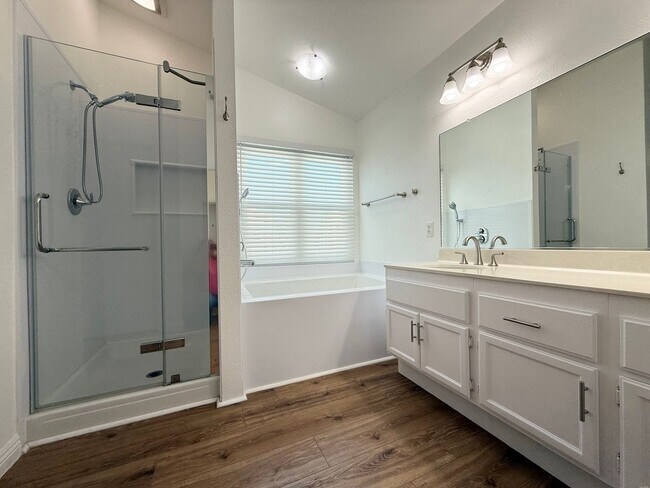 Building Photo - Corner Lot Beauty with Open Living, Guest Suite Down & Expansive Backyard