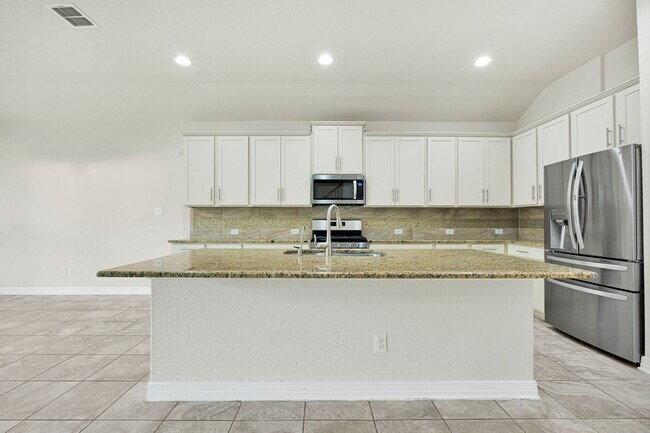 Building Photo - Spacious 5-Bedroom Beauty in Triana Neighborhood –  with Community Perks!