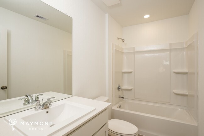 Building Photo - Live the Sunterra Lifestyle: Lagoon, Pool & More