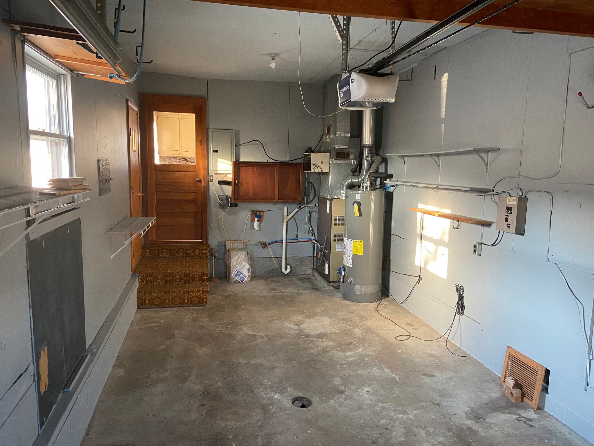 Heated Garage - Facing the house from the garage door. Washer & Dryer Hookups. - 704 E Pike St