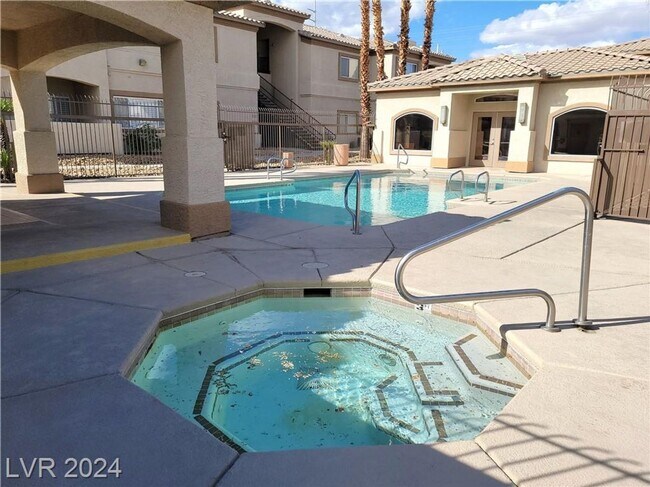 Building Photo - SECOND-FLOOR UNIT IN A GATED SOUTHWEST COM...