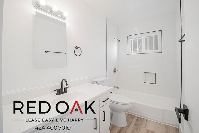 Building Photo - 211 S Ave 57