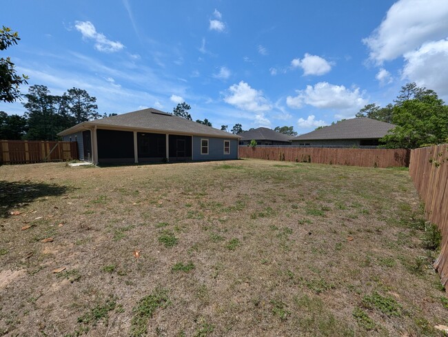 Building Photo - 8934 E River Dr