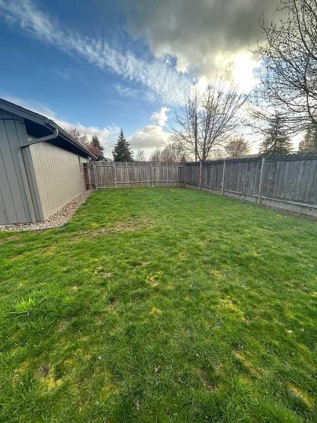 Building Photo - Beautifully Remodeled 2 Bedroom 1 Bath Duplex w/ Large Yard!! Pets are welcome! Electric car char...