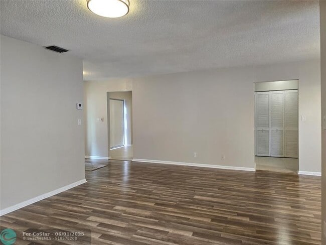 Building Photo - 4455 Carambola Cir N
