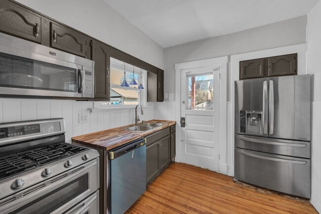 Building Photo - NORWOOD – Stunning Old-World Charm with Modern Comforts