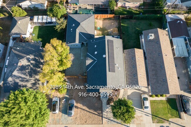 Building Photo - 7089 14th Ave