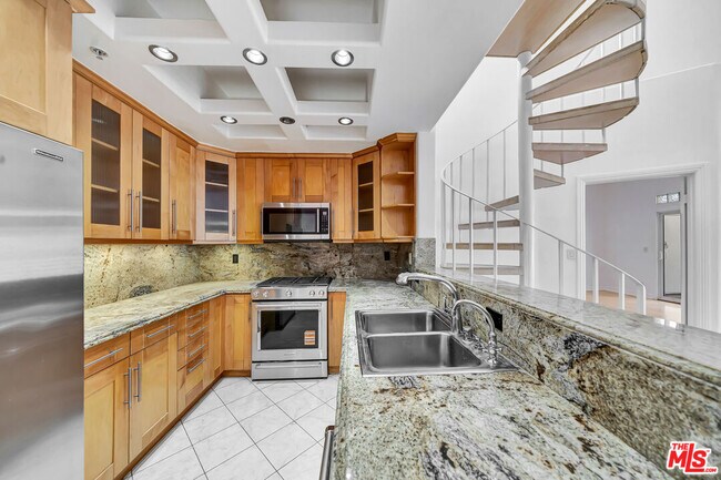 Building Photo - 4477 Woodman Ave