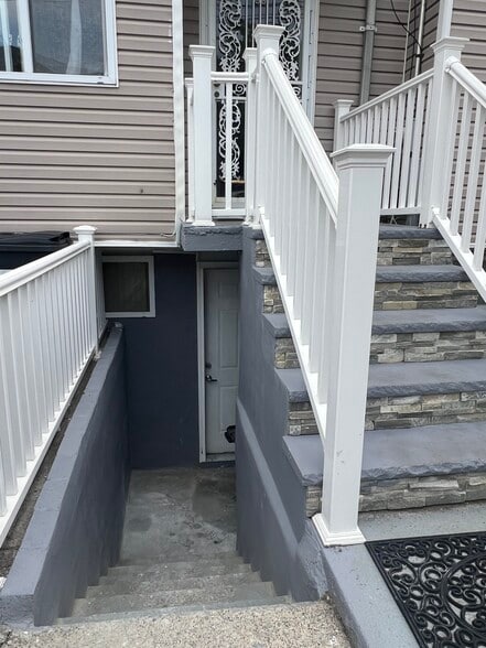 Few step down basement private entrance. - 28 Nunzie Ct