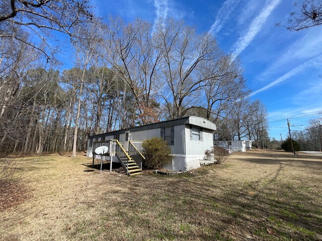 Building Photo - Two bedroom + Office mobile home in peacef...