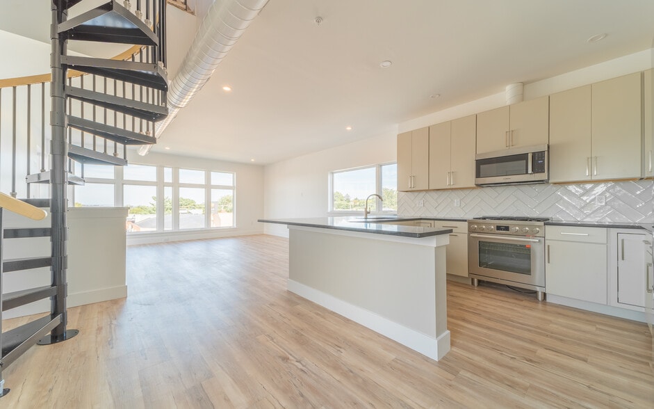 Kitchen, Living Room & Staircase to private rooftop deck - 428 Penn Ave