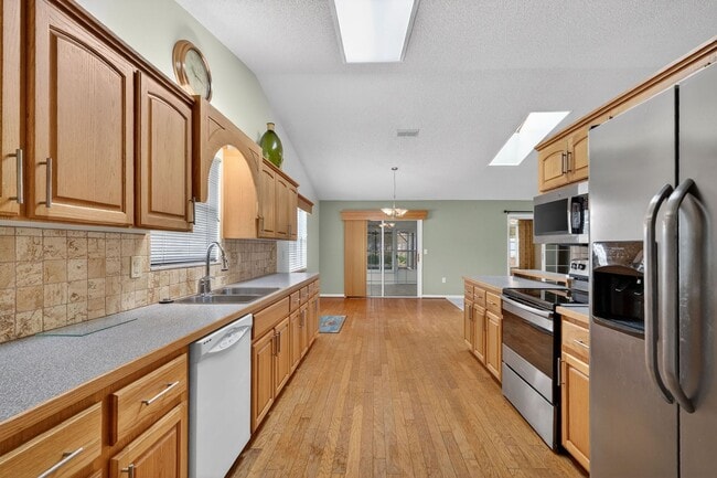 Building Photo - Available Now in Scottish Highlands | 2BR/2BA + Den in Active 55+ Community