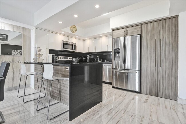 Building Photo - 19370 Collins Ave