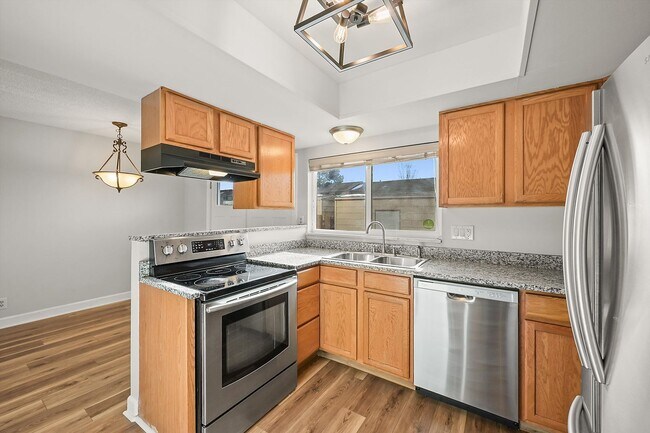 Building Photo - 3BR Townhome in Aurora | Private Yard, Covered Parking & Community Pool