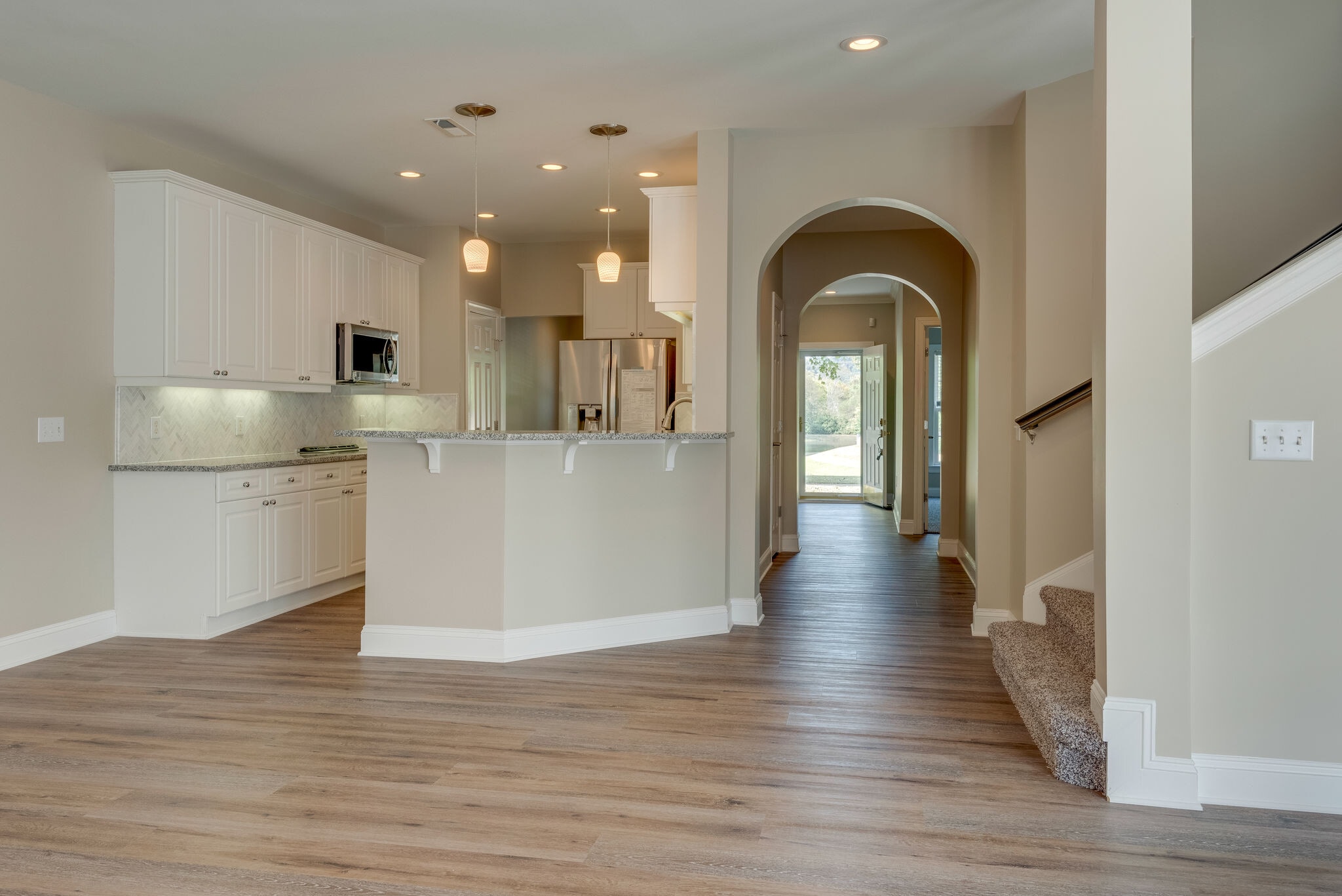 View into Kitchen and Snack Bar - 618 Springlake Dr
