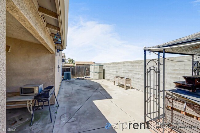 Building Photo - 5 br, 3 bath House - 1003 Sun Meadow Drive...