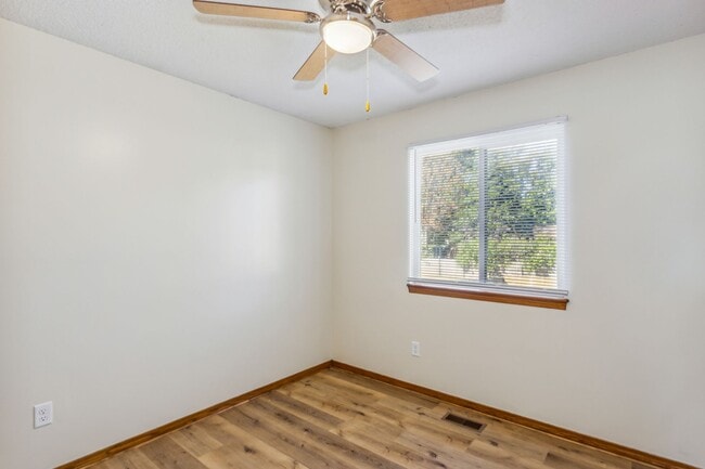 Building Photo - Derby Duplex with Fenced Yard!