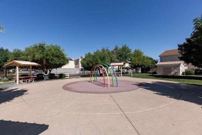Building Photo - Two bedroom townhome with garage in gated ...