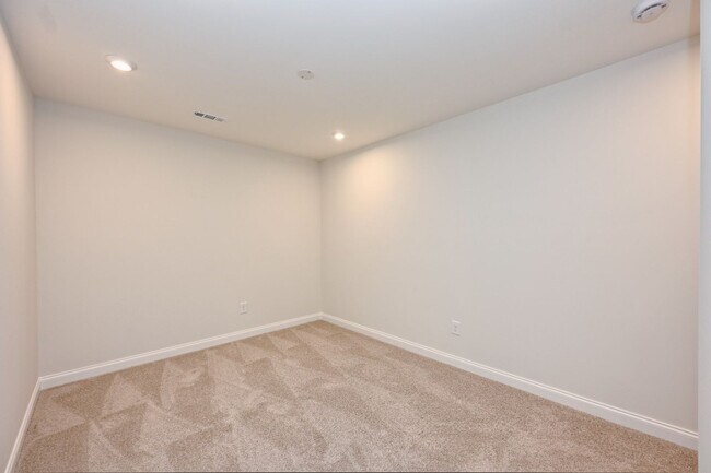 Building Photo - **BE THE LUCKY ONE TO LIVE IN THIS 2024-BUILT TOWNHOME**
