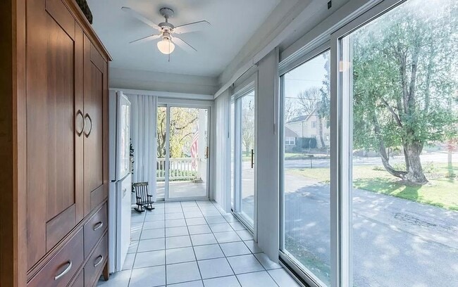 Building Photo - Spacious 4-Bedroom Home with Sunroom, Garage & Private Driveway!