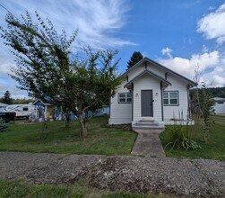 Building Photo - Adorable Four Bedroom w/ Fenced Yard Avail...