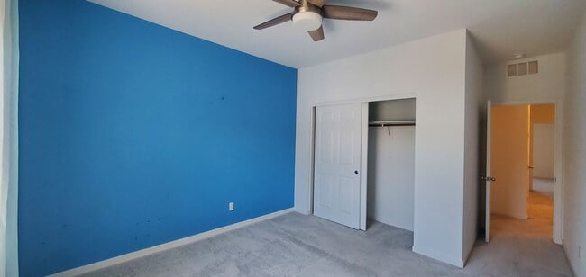 Building Photo - Beautiful townhome features a bright, open-concept layout