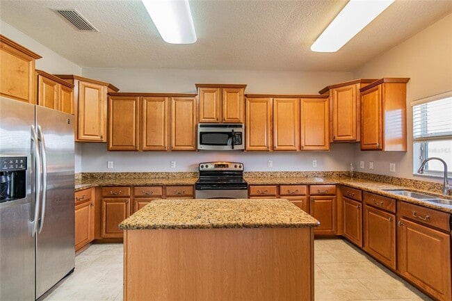 Building Photo - 8016 Alamosa Wood Ave