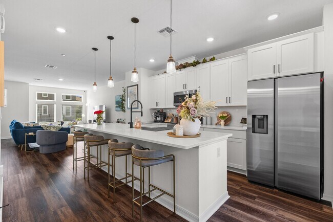 Building Photo - Upgraded 3BR/3.5BA Laureate Park Townhome | 2-Car Garage + EV Charging
