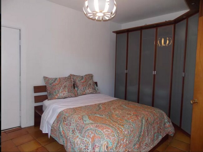 Building Photo - Furnished 1BR Suite in East Rock | Private Gated Garden | Cathedral Ceilings & Skylights