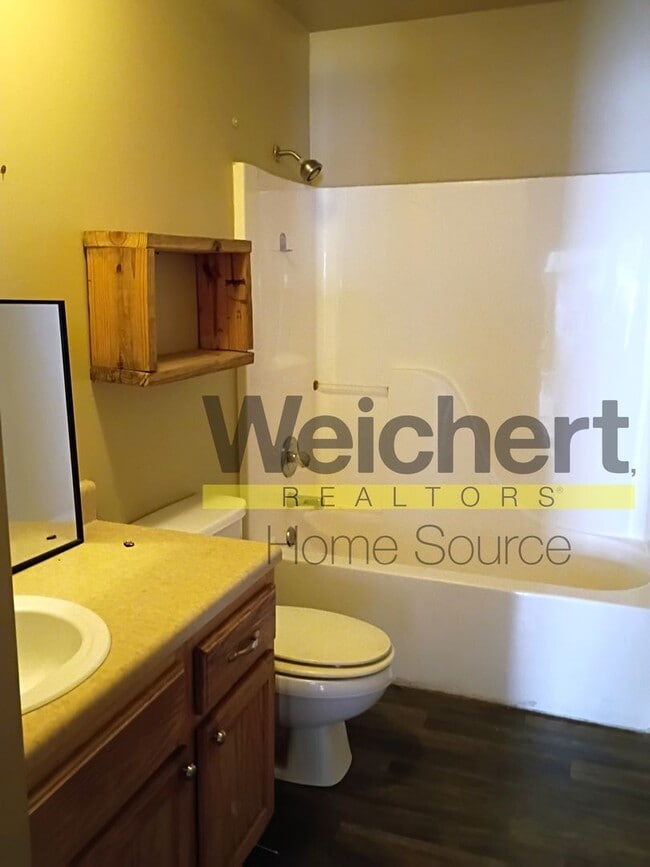 Building Photo - Spacious 3-Bedroom Home with Garage and Sc...
