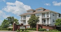 Building Photo - 2 Bedroom Condo w/Open Floor-Plan & Stainless Steel Appliances! Some Utilities Included!