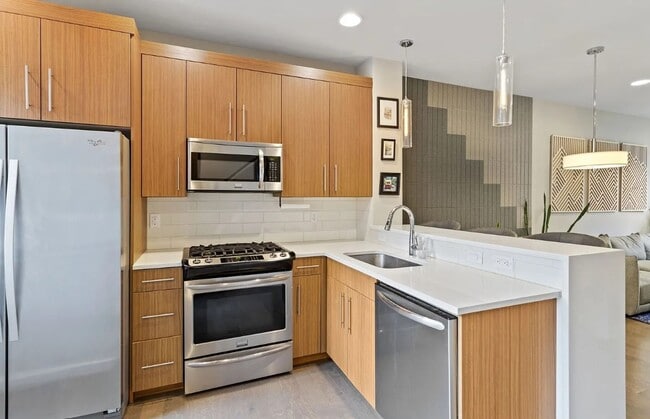Building Photo - Dual Masters! Stunning Modern End-Unit Townhome in Buckman Bright, Airy & Designed for Comfort
