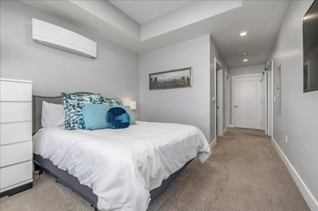 Building Photo - COME HOME TO REFINED DOWNTOWN LUXURY CONDO...