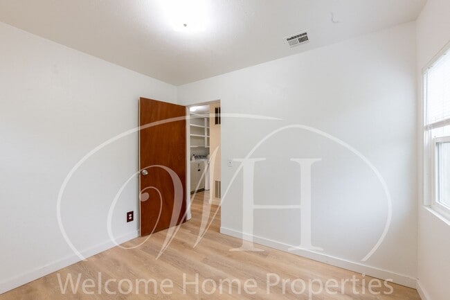 Building Photo - Comfortable 3-Bedroom Home with Fenced Yard and Attached Carport