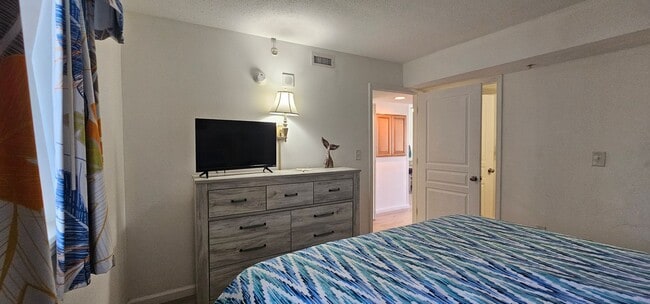 Building Photo - Beach Living at Its Finest – Fully Furnished 1BR/1BA Condo | All Utilities Included