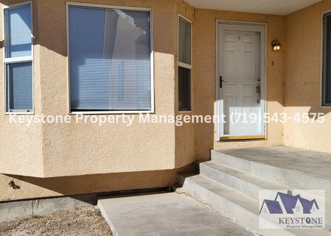 Building Photo - $948 Off Move In Special! Spacious Pueblo West Duplex 3 Bed/3 Bathroom Unit with 2 Car Garage  $1...