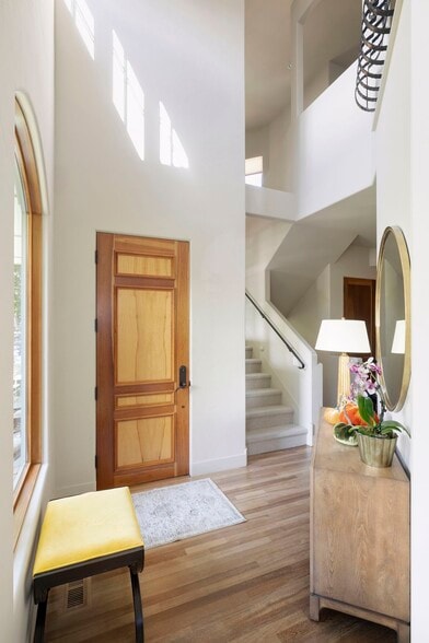 Step into this lovely entryway with soaring ceilings and an inviting main level - 745 Rice St E