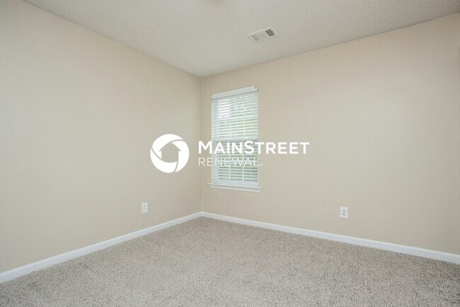 Building Photo - 5 Bedroom Pet-Friendly Home in Fairburn, GA with Main Street Renewal