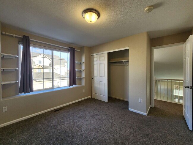 Building Photo - Spacious Two-Suite Townhome With Garage, Fireplace And Community Pool