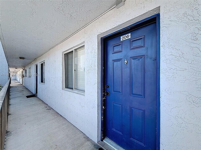 Building Photo - 8740 N Sherman Cir