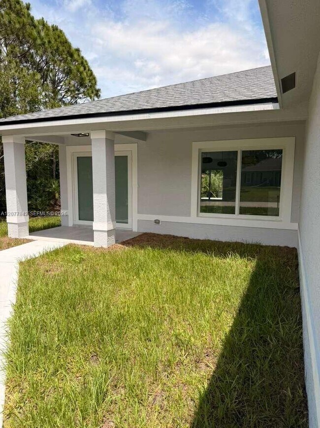 Building Photo - 8636 100th Ct