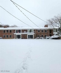 Building Photo - 6960 Carriage Hill Dr