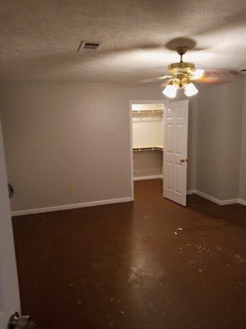 Bedroom with fan and walk-in closet - 140 Lemmon Drive